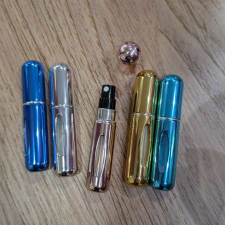 Travel spray métallisé